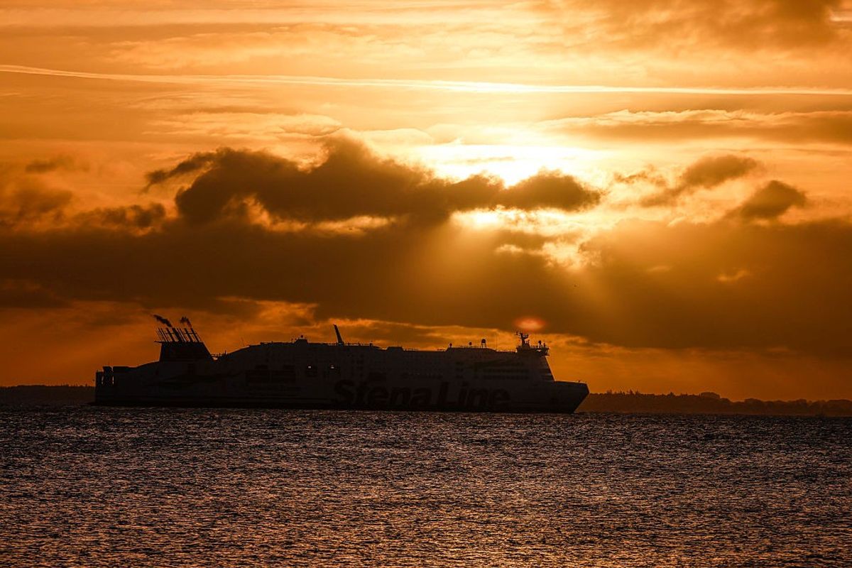 A ship crosses the Baltic Sea at sunrise