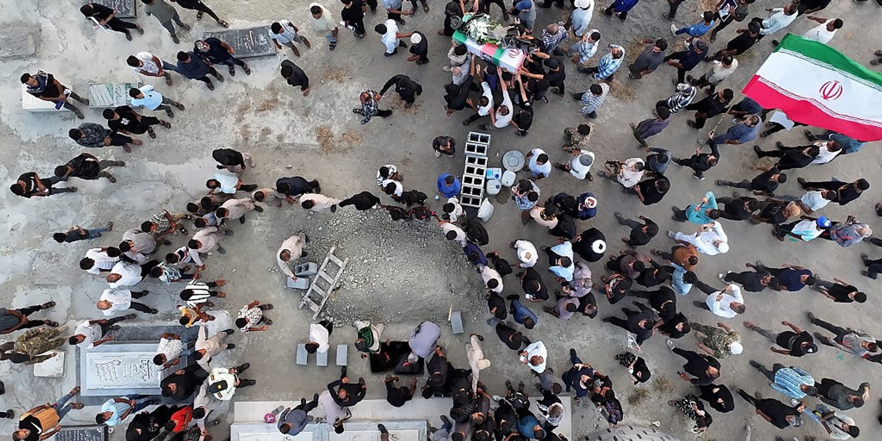 Aftermath Of Alleged US Strike On Wedding Party In Southern Iran KUHESTAK, IRAN - SEPTEMBER 03: Aerial view during funeral and burial ceremonies for the victims of an alleged U.S. strike on a wedding party on September 03, 2026 in the village of Kuhestak, Sirik County, in the Hormozgan Province of Iran. According to Iran's foreign ministry spokesman, Esmaeil Baqaei, four people, including a child, were killed and 68 injured when shrapnel from a U.S. missile hit a house where a wedding celebration was taking place on September 02, 2026. The U.S. military's Central Command said U.S. forces struck Islamic Revolutionary Guard Corps (IRGC) targets and that the U.S. military never targets civilians. Iran has responded by launching attacks on Jordan, Bahrain and Kuwait, as the regional conflict escalates following a month of relative calm. (Photo by Morteza Akhondi/Getty Images)