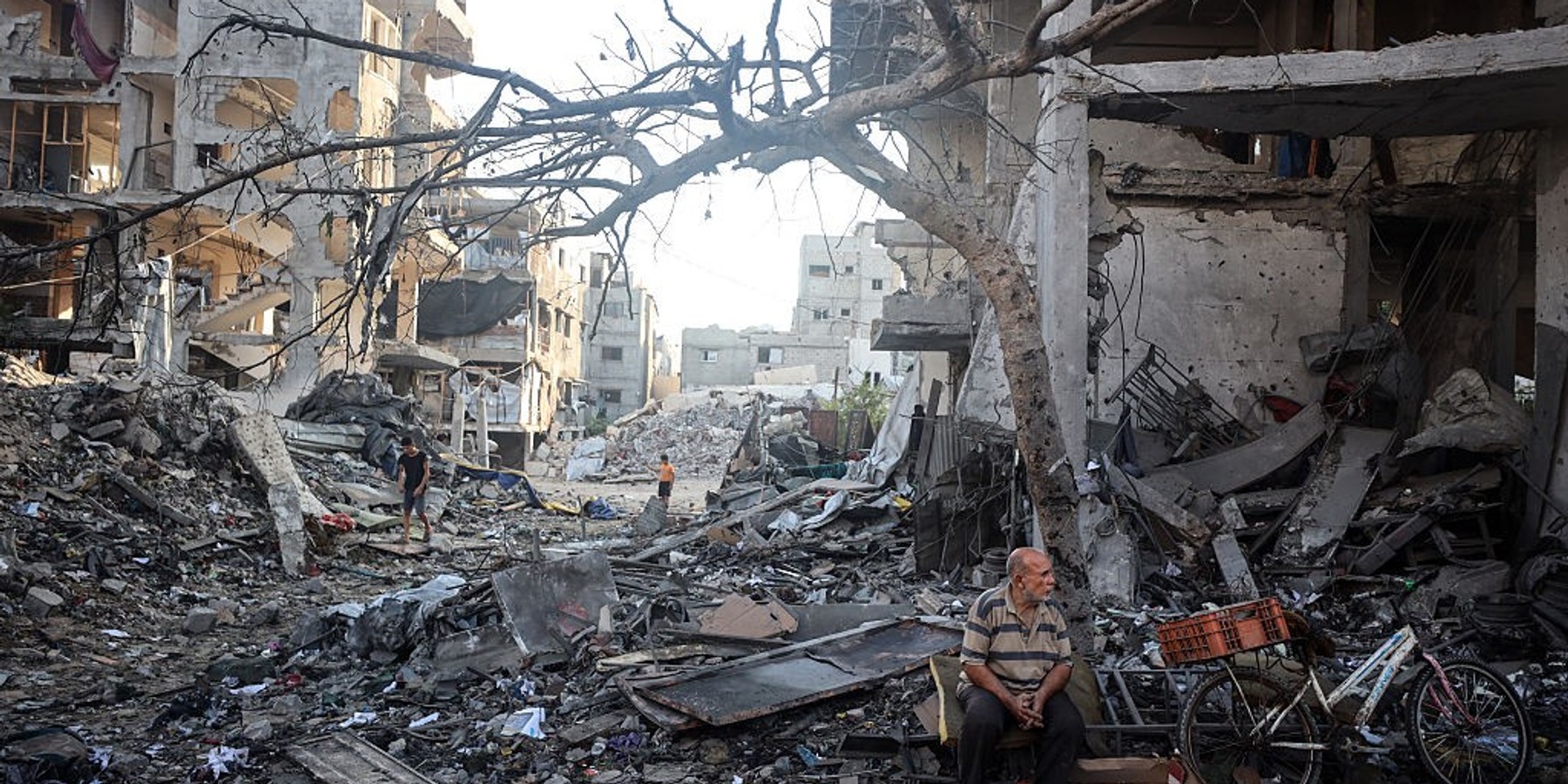 Aftermath of Israeli Airstrike In Gaza A Palestinian man rests amid debris at the site of an Israeli strike on a house in Gaza City, on July 30, 2026. The strike followed warnings to evacuate the area. Gaza remains subject to daily violence, with both the Israeli military and Hamas accusing one another of violating the truce in effect since October 10. The conflict has flattened swathes of the territory, displaced most of the population at least once, and left hundreds of thousands of people living in tents and temporary shelters. (Photo by Majdi Fathi/NurPhoto via Getty Images)