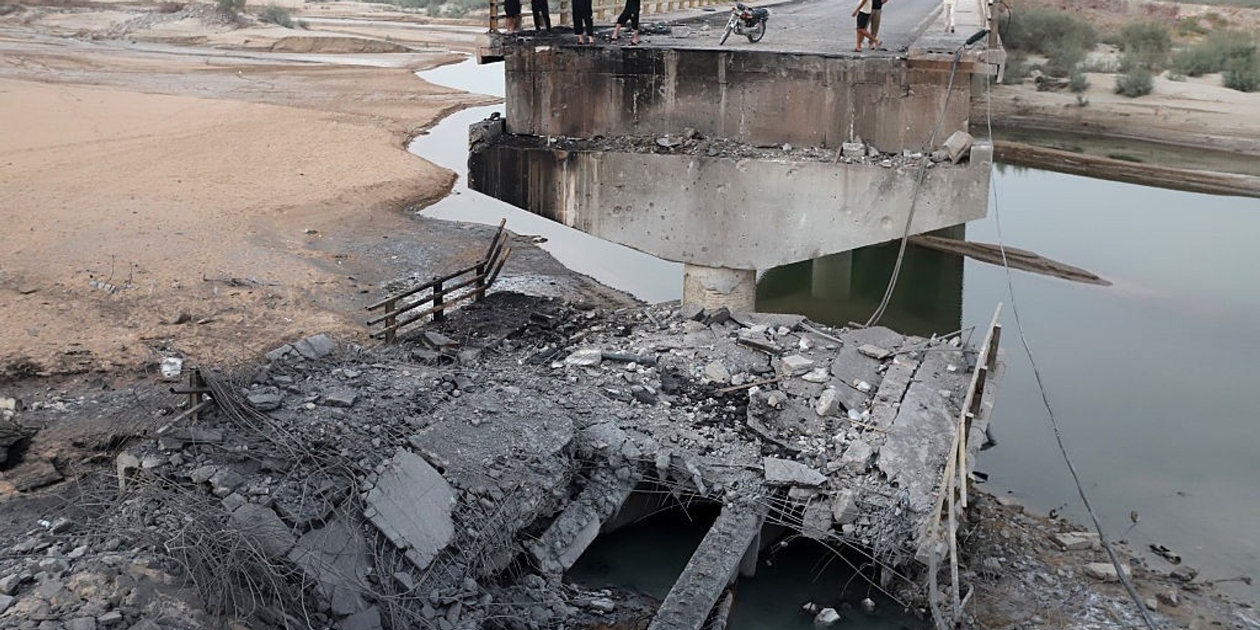 Damage caused by US strikes in Iran's Hormozgan province HORMOZGAN, IRAN - JULY 19: The bridge linking Bandar Abbas and Kehuristan, rendered unusable in a US strike, is seen in Iran's Hormozgan province, where Iranian authorities said the United States carried out attacks on 95 locations across 12 cities over the past 10 days, on July 19, 2026. (Photo by Amir Hossein Khorgooei/Anadolu via Getty Images)