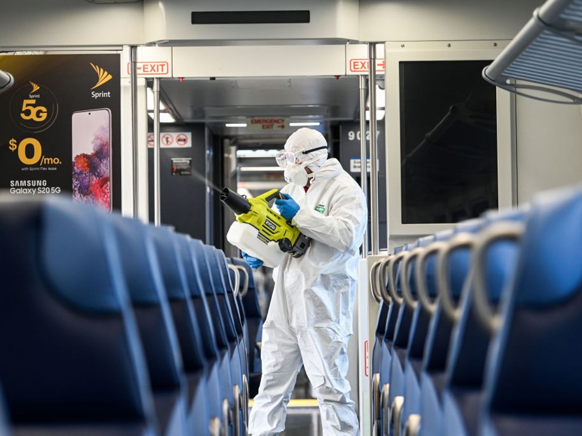 Hicksville, N.Y.: A Long Island Rail Road employee disinfects a train car with an eco-friendly cleaner while at the Hicksville, New York LIRR station on March 19, 2020.