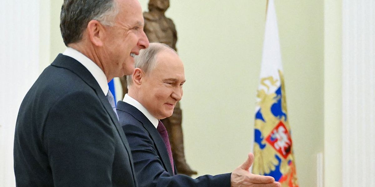In this pool photograph distributed by Russian state agency Sputnik, Russia's President Vladimir Putin (R) greets US Special Envoy Steve Witkoff (L) prior to their talks in Moscow on April 25, 2025.