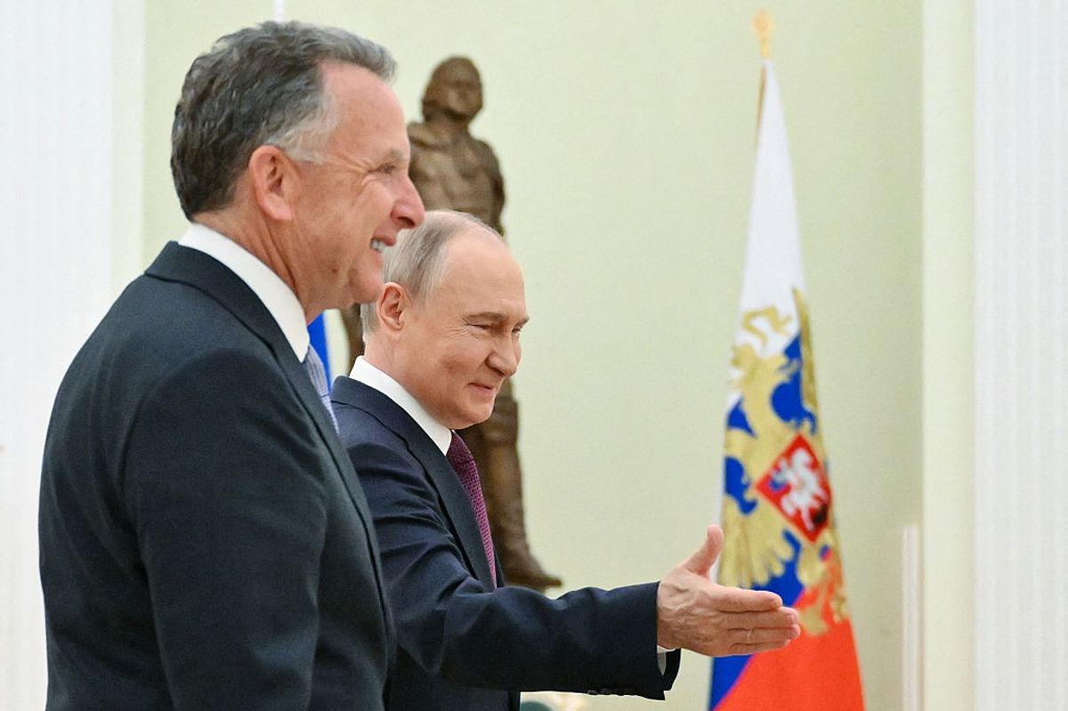 In this pool photograph distributed by Russian state agency Sputnik, Russia's President Vladimir Putin (R) greets US Special Envoy Steve Witkoff (L) prior to their talks in Moscow on April 25, 2025.
