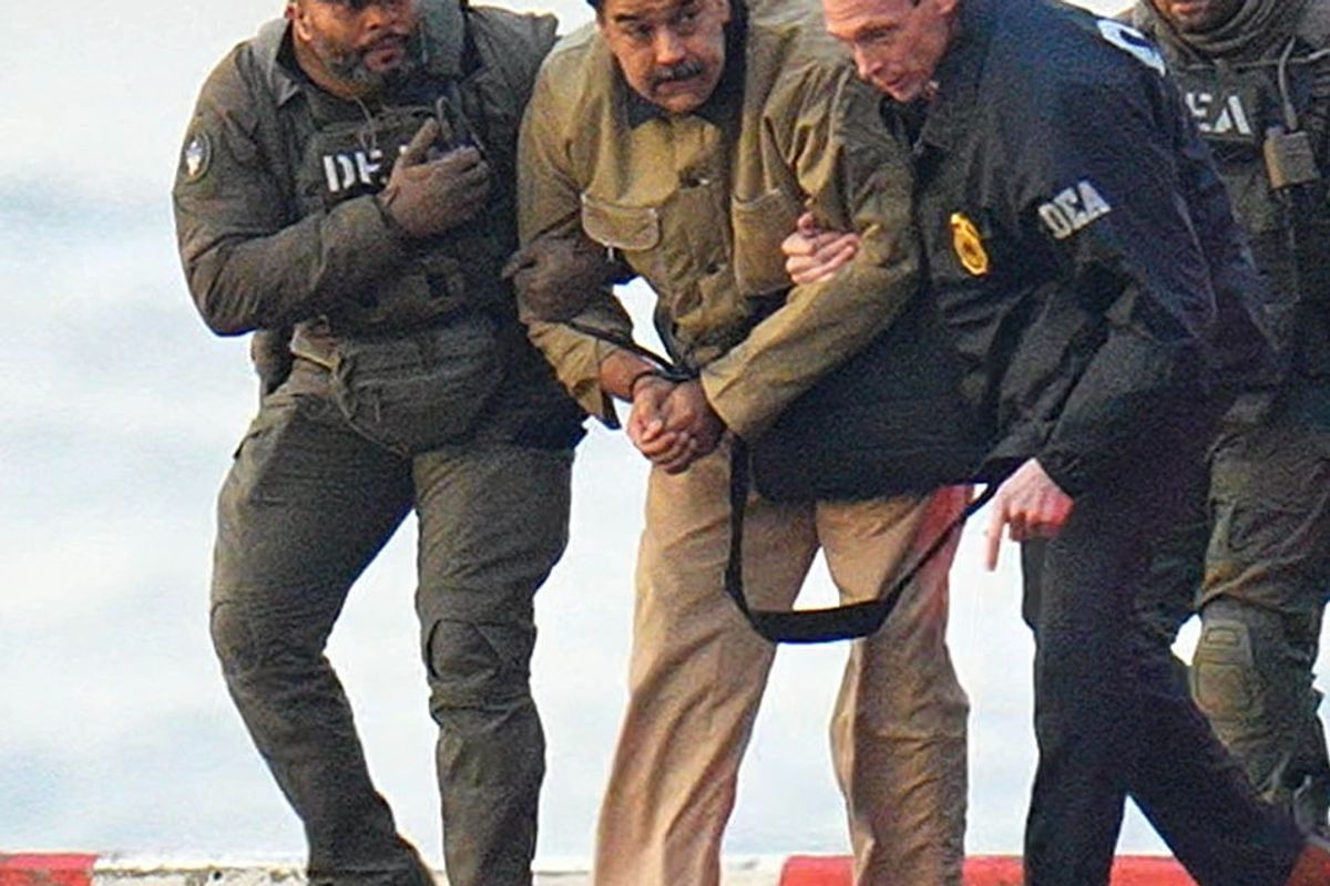 Nicolas Maduro is seen in handcuffs after landing at a Manhattan helipad, escorted by heavily armed Federal agents as they make their way into an armored car en route to a Federal courthouse in Manhattan on January 5, 2026 in New York City.