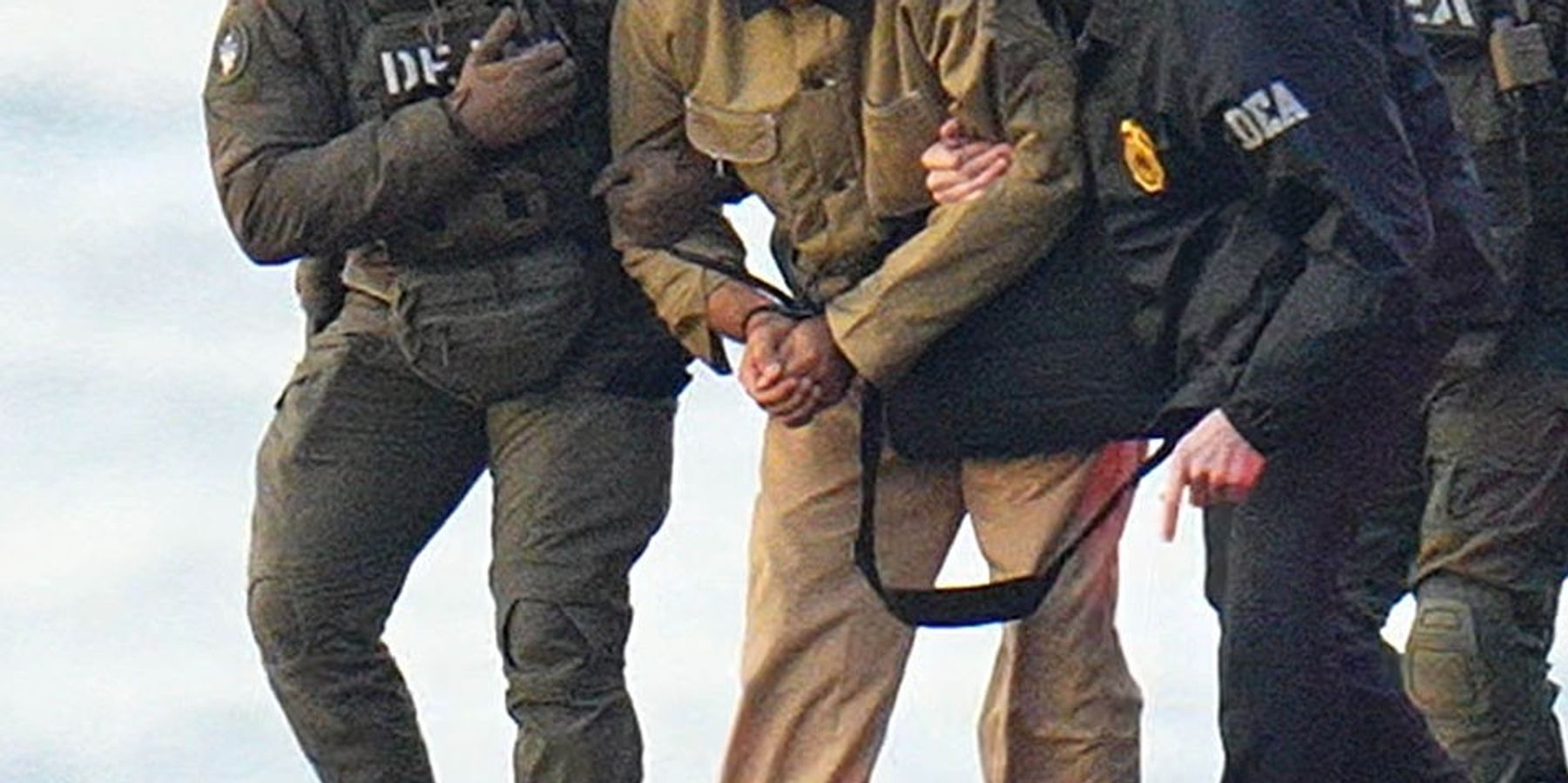 Nicolas Maduro is seen in handcuffs after landing at a Manhattan helipad, escorted by heavily armed Federal agents as they make their way into an armored car en route to a Federal courthouse in Manhattan on January 5, 2026 in New York City.