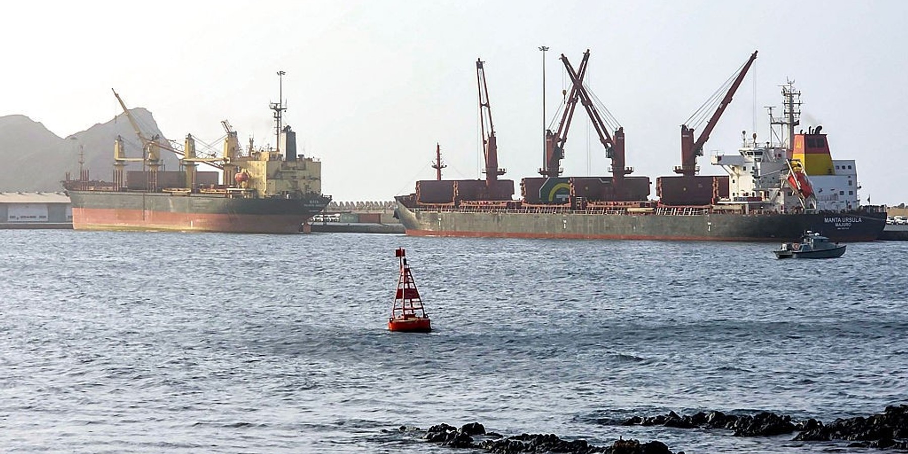 OMAN-IRAN-US-ISRAEL-WAR-MARINE-SHIPPING The Marshall Islands-flagged bulk carrier vessel Manta Ursula is pictured moored in Muscat on July 25, 2026. An incident involving a tanker and unspecified military forces was reported on July 25 near the Strait of Hormuz waterway, according to the United Kingdom Maritime Trade Operations monitor. (Photo by AFP via Getty Images) /