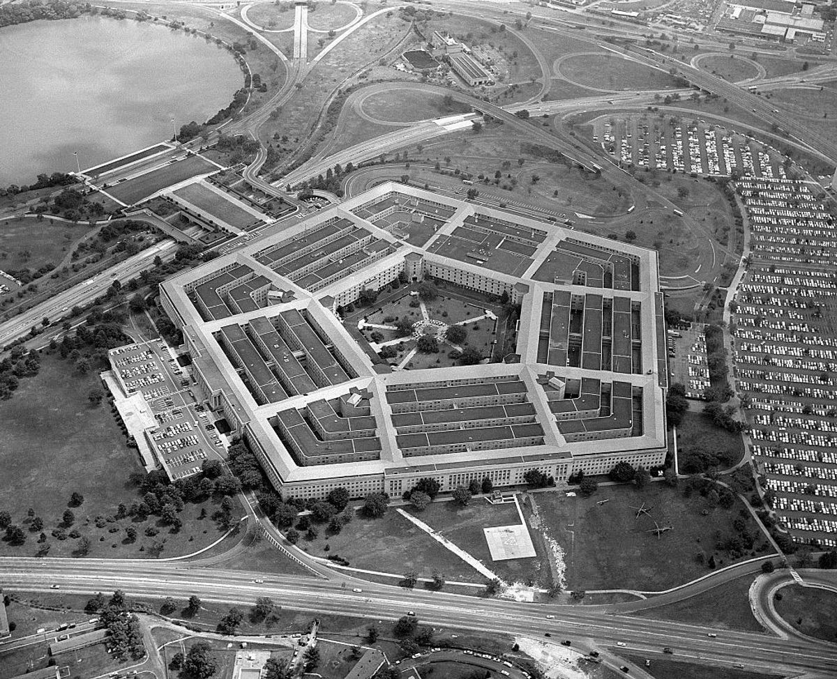 (Original Caption) 9/5/1963-Washington, DC- Flying over the Virginia side of the Potomac River, the impressive site of the world's largest office building crops into view. The Pentagon, which covers 34 acres of land including a 5-acre pentagonal center court, houses personnel of the U.S. Department of Defense, which includes the Departments of Army, Navy and Air Force. This bird's eye view also shows part of the 67-acre parking space area.