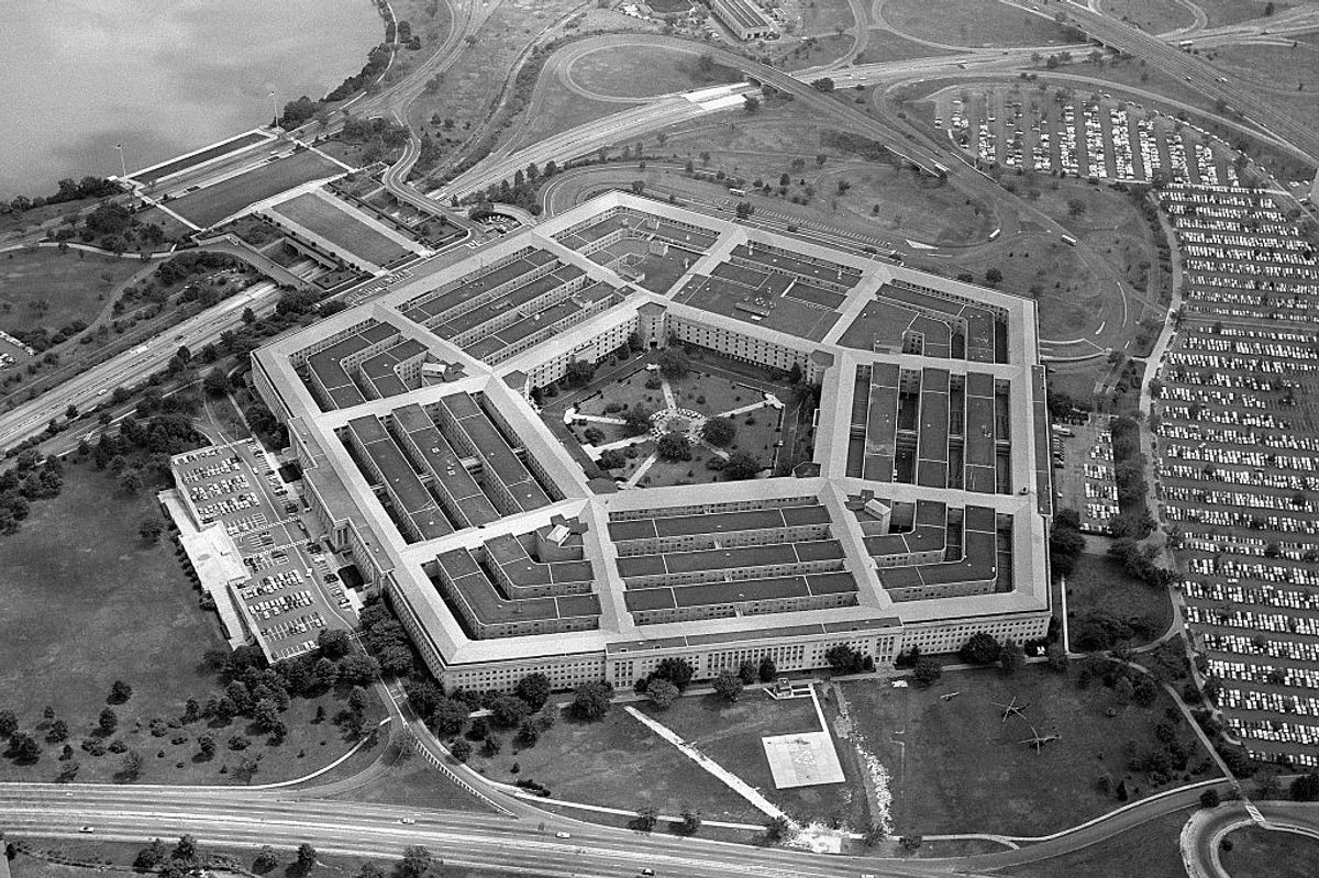 (Original Caption) 9/5/1963-Washington, DC- Flying over the Virginia side of the Potomac River, the impressive site of the world's largest office building crops into view. The Pentagon, which covers 34 acres of land including a 5-acre pentagonal center court, houses personnel of the U.S. Department of Defense, which includes the Departments of Army, Navy and Air Force. This bird's eye view also shows part of the 67-acre parking space area.