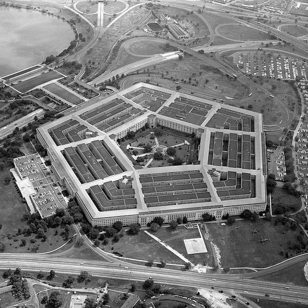 (Original Caption) 9/5/1963-Washington, DC- Flying over the Virginia side of the Potomac River, the impressive site of the world's largest office building crops into view. The Pentagon, which covers 34 acres of land including a 5-acre pentagonal center court, houses personnel of the U.S. Department of Defense, which includes the Departments of Army, Navy and Air Force. This bird's eye view also shows part of the 67-acre parking space area.