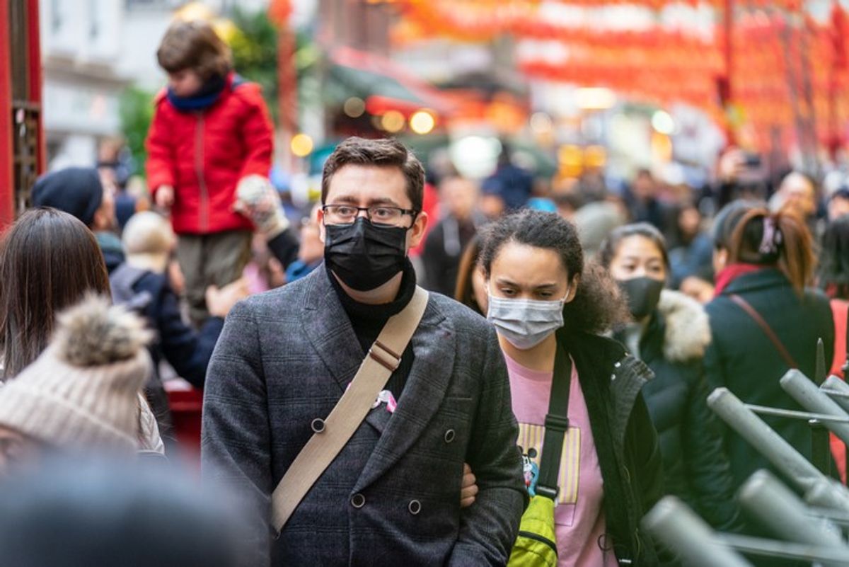 <p>People wearing a face masks to protecting themself because of epidemic in China. Selective Focus. Concept of coronavirus quarantine.</p>