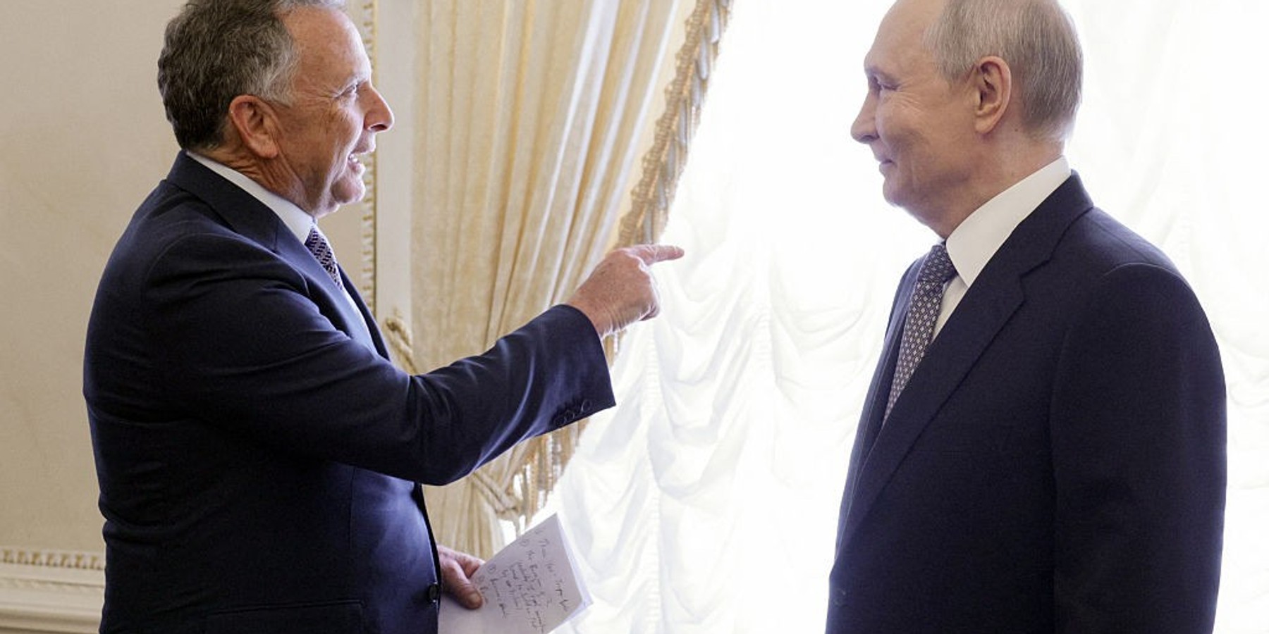 RUSSIA-US-UKRAINE-DIPLOMACY-CONFLICT In this pool photograph distributed by the Russian state agency Sputnik, Russia's President Vladimir Putin (R) speaks with US special envoy Steve Witkoff (L) during their meeting in Saint Petersburg on October 21, 2026. (Photo by Gavriil GRIGOROV / POOL / AFP via Getty Images) / Editor's note: This image is distributed by the Russian state owned agency Sputnik