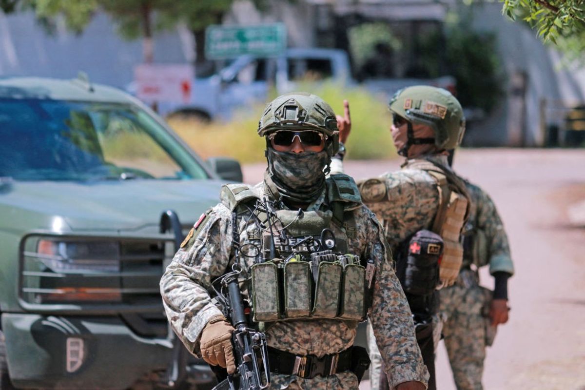 Soldiers of the Mexican Army stand guard as they secure an area during a military operation in Culiacan, Sinaloa State, Mexico, on September 19, 2024