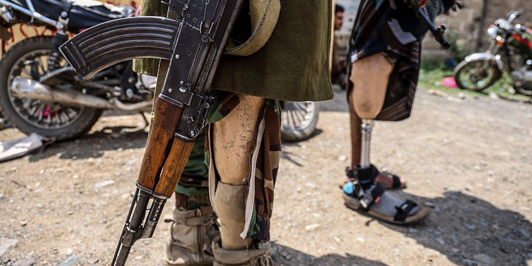 TOPSHOT-YEMEN-SAUDI-ISRAN-US-ISRAEL-WAR TOPSHOT - Disabled Saudi-backed Yemeni government soldiers gather at the Jabal Han front west of the city of Taiz following fierce battles earlier in the day as Yemen's Houthis reportedly attempted to seize control of the main route between the inland city of Taiz and the coastal city of Aden, on October 3, 2026. The civil war, which dates to 2014 but had been dormant following a truce in 2022 roared back to life in July, as the wider Middle East war ignited another front. The Houthis, a predominantly Zaidi Shia group whose heartlands lie in the north of the country, have since early in the war controlled most of Yemen's populated areas. The internationally recognised government, which has been backed militarily by a Saudi-led coalition since 2015, controls the south including the port city of Aden. (Photo by Ahmad AL-BASHA / AFP via Getty Images)