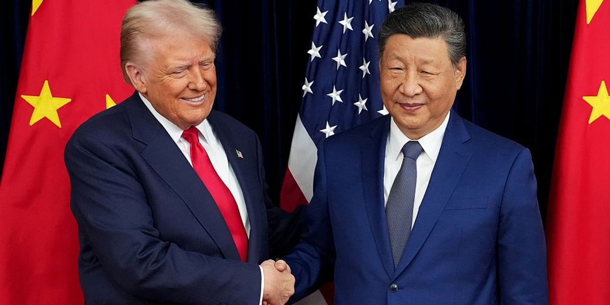 U.S. President Donald Trump greets Chinese President Xi Jinping ahead of a bilateral meeting at Gimhae Air Base on October 30, 2025 in Busan, South Korea.