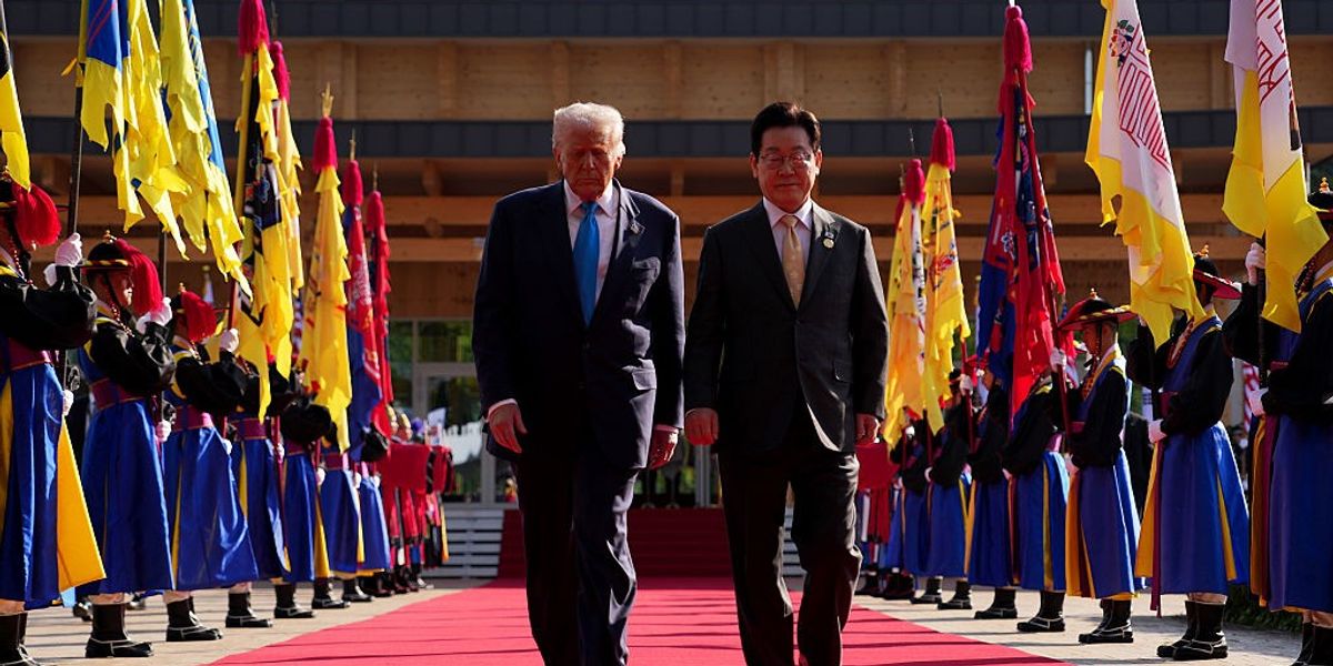 U.S. President Donald Trump walks with South Korean President Lee Jae Myung as they prepare to attend a bilateral lunch meeting at the Gyeongju National Museum on October 29, 2025 in Gyeongju, South Korea