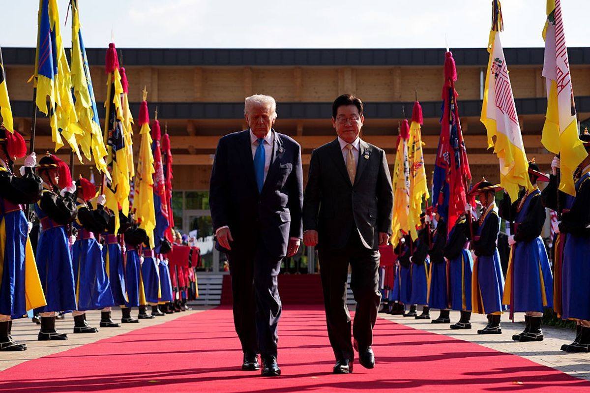 U.S. President Donald Trump walks with South Korean President Lee Jae Myung as they prepare to attend a bilateral lunch meeting at the Gyeongju National Museum on October 29, 2025 in Gyeongju, South Korea