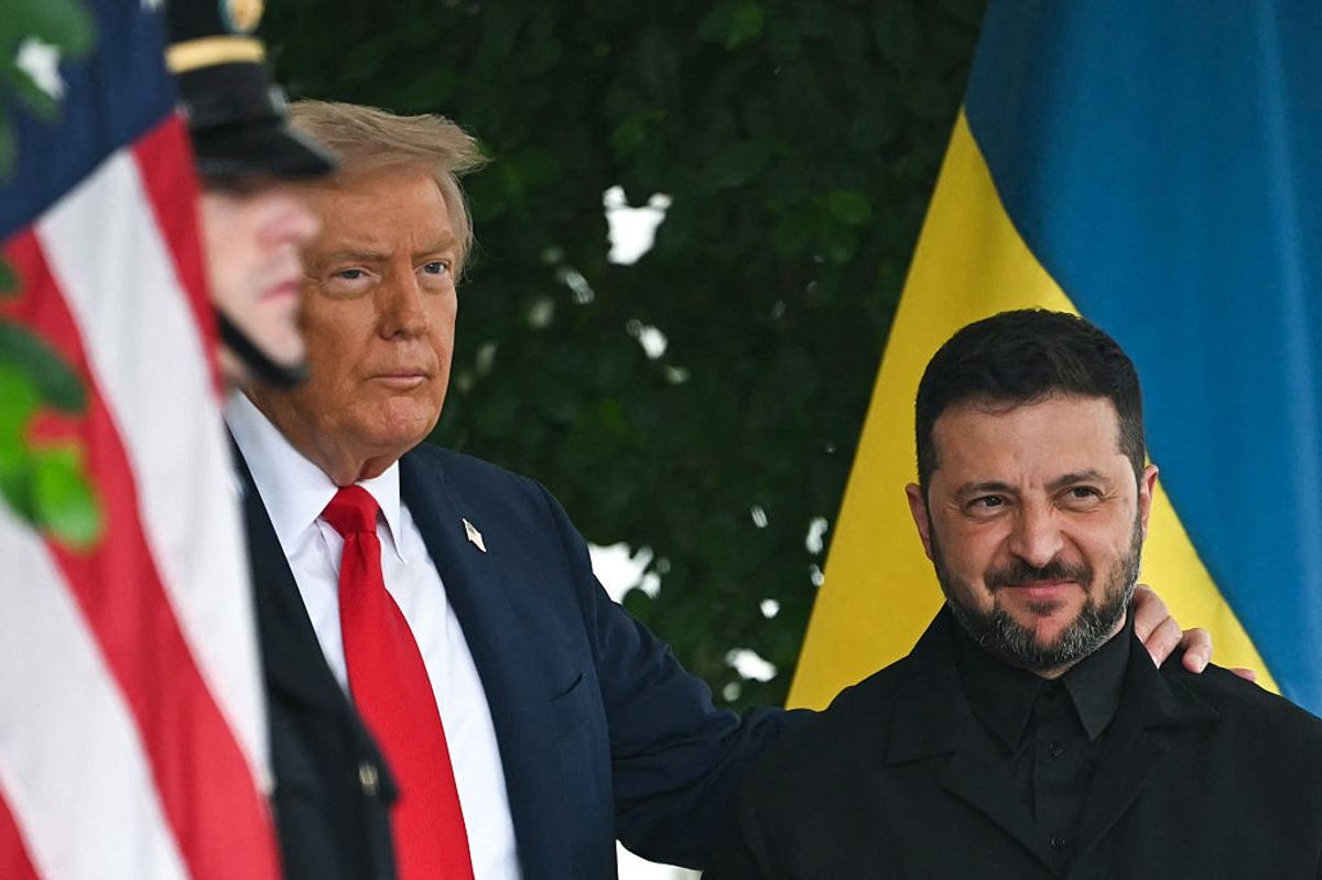 Ukrainian President Volodymyr Zelensky is greeted by US President Donald Trump (L) upon arrival at the White House West Wing in Washington, DC, on August 18, 2025. 