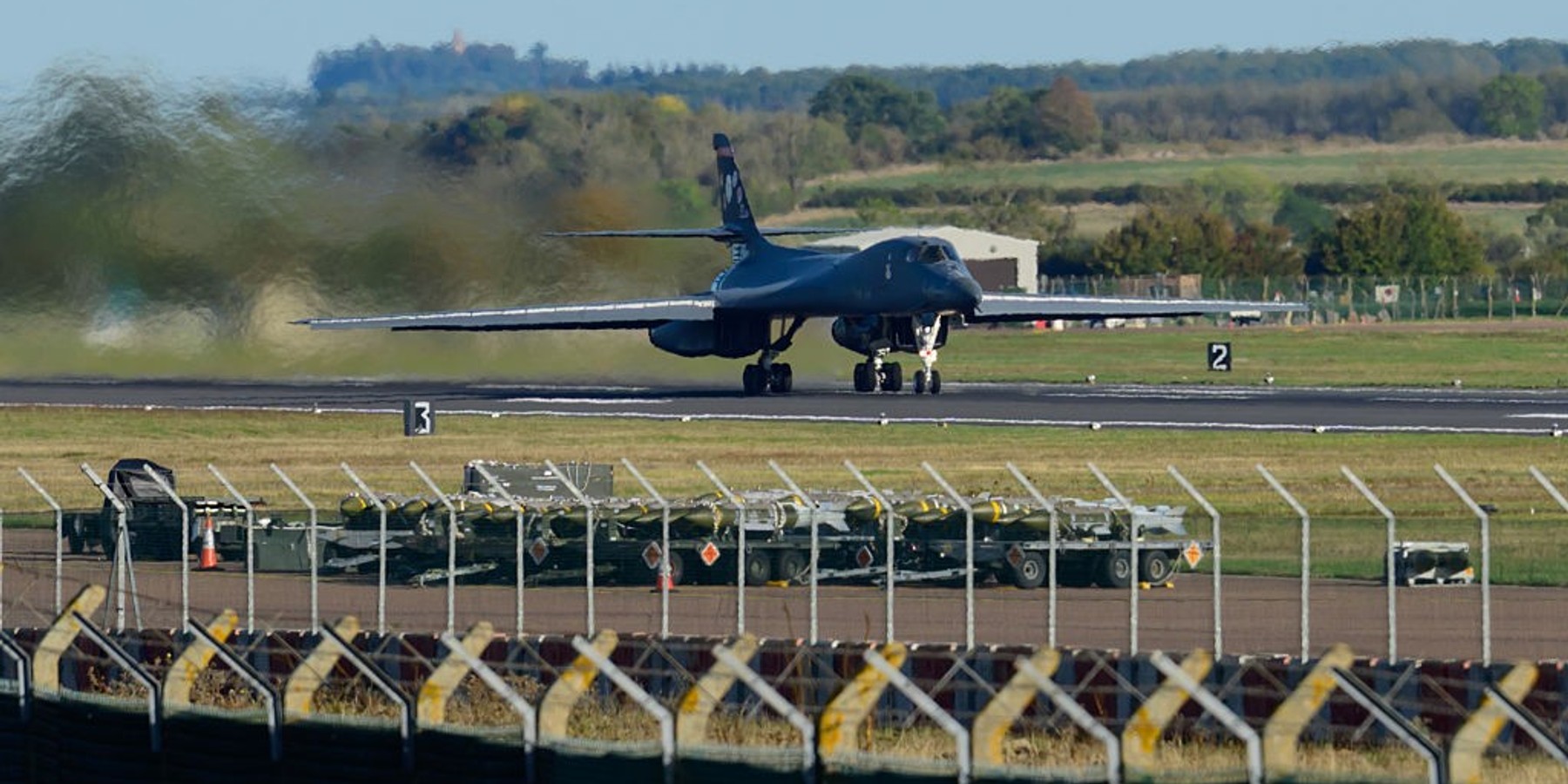 US Bombers Depart RAF Fairford For Home FAIRFORD, ENGLAND - OCTOBER 4: Munitions sit beside runway 27 as a Rockwell B1 Lancer heavy bomber departs for home at RAF Fairford on October 04, 2026 in Fairford, United Kingdom. Around a dozen US B-1B Lancer bombers remain stationed at RAF Fairford in Gloucestershire, following a significant military drawdown late last month that saw six B-52 Stratofortress bombers return across the Atlantic. The heavy aircraft are part of an American forward strike force that has used the Gloucestershire airfield to conduct missions against Iranian capabilities, with total aircraft numbers at the Gloucestershire hub previously peaking between 21 and 23 strategic bombers earlier this year. (Photo by David Bown/Getty Images)
