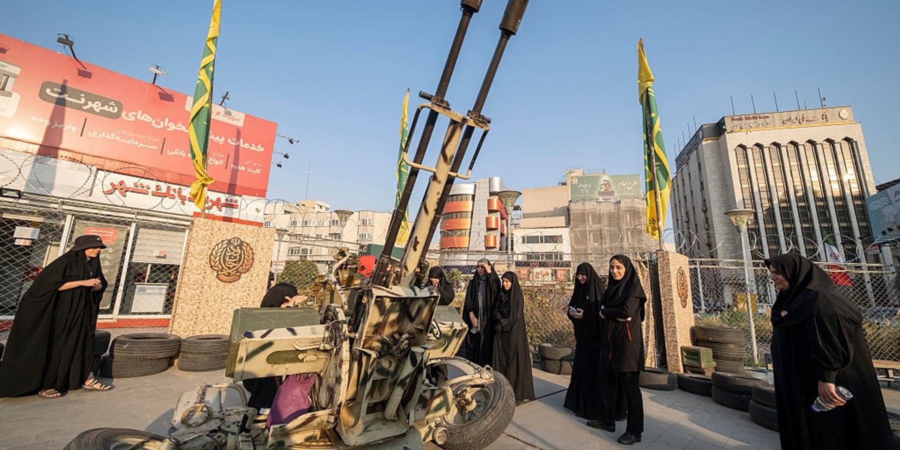 Weapons Training For Iran's Female "self-sacrificing" Forces Female members of Iran's ''self-sacrificing'' forces gather around an anti-aircraft gun during military training at a city-square training camp in downtown Tehran, Iran, on October 12, 2026, amid escalating tensions between Iran and the United States. U.S. President Donald Trump has issued renewed threats against Iran, warning of further escalation if Tehran fails to meet Washington's demands. (Photo by Morteza Nikoubazl/NurPhoto via Getty Images)