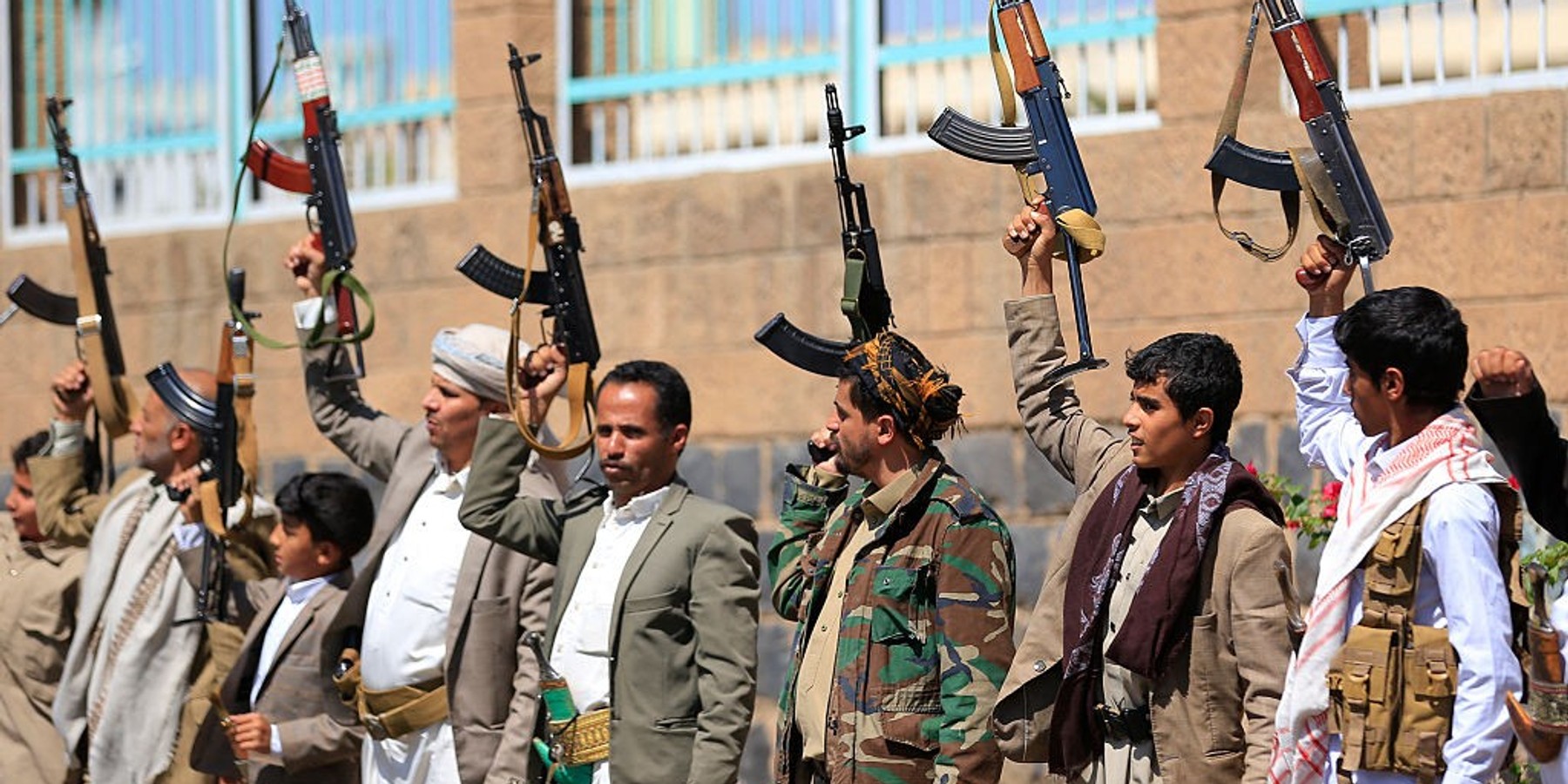 YEMEN-SAUDI-IRAN-US-ISRAEL-WAR Fighters loyal to the Houthi authorities, take part in a rally to recruit more fighters, in Sanaa on October 7, 2026. The Houthis claimed a flurry of attacks on Saudi targets on October 7 including firing a ballistic missile at Riyadh airport, as the group battles for territory in Yemen against government forces supported by the kingdom. (Photo by Mohammed HUWAIS / AFP via Getty Images)