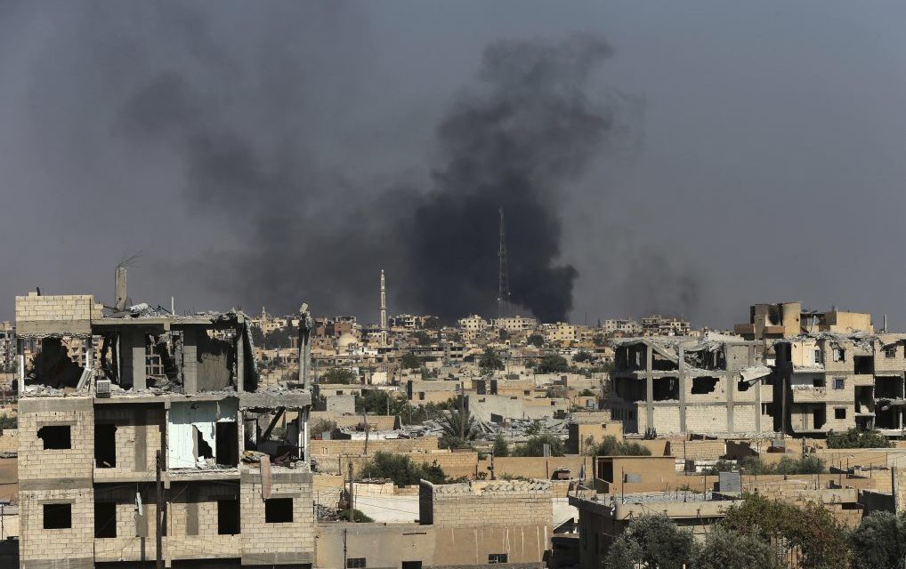 Smoke rises in Raqqa, Syria.