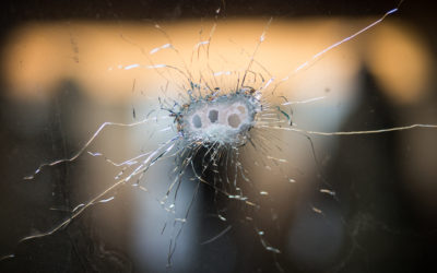 Bullet holes in window