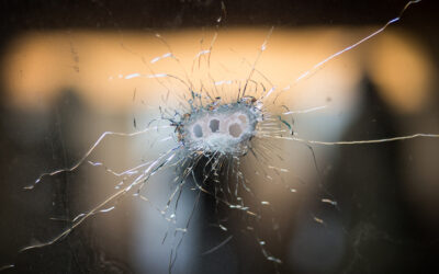 Bullet holes in window