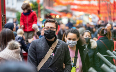 People wearing a face masks to protecting themself because of epidemic in China. Selective Focus. Concept of coronavirus quarantine.